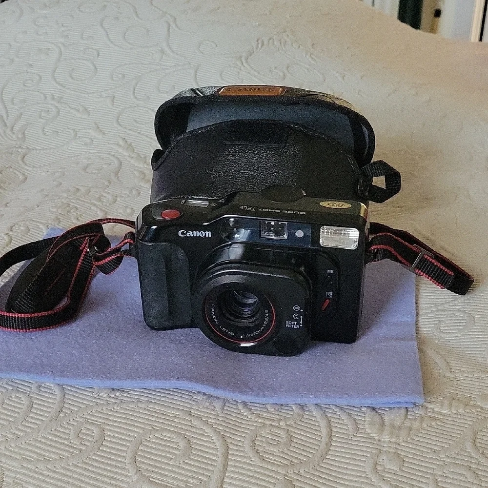 Canon Vintage Black Film Camera with Red Accents